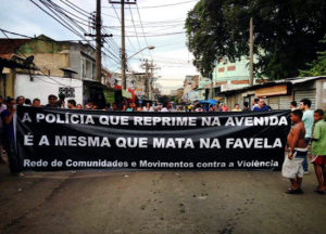 Πορεία στο Ρίο. "Η αστυνομία που καταστέλλει στους δρόμους είναι η ίδια που σκοτώνει στις φαβέλες!" Photo: CrimethInc.